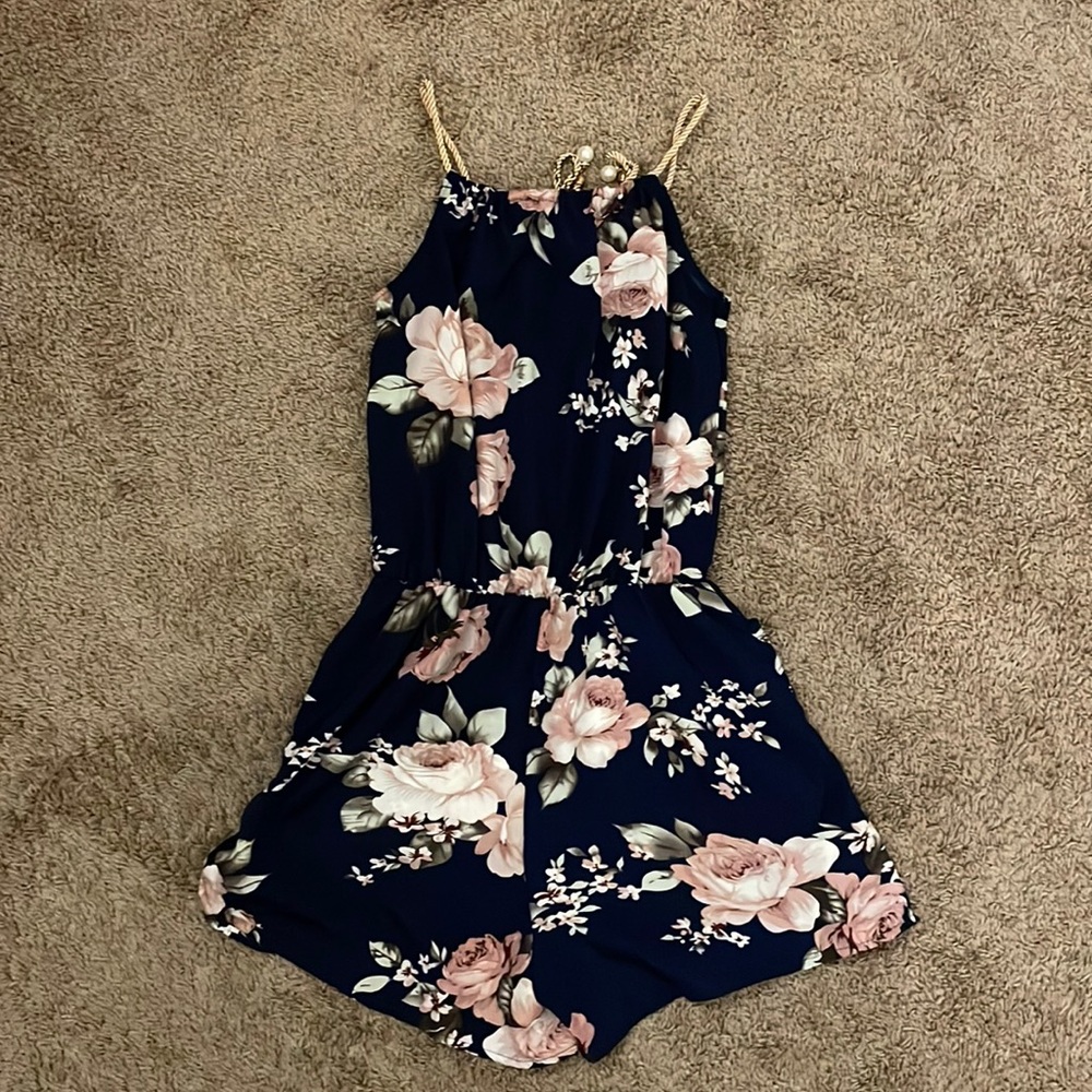 Blue floral romper with gold straps. Size M/S.